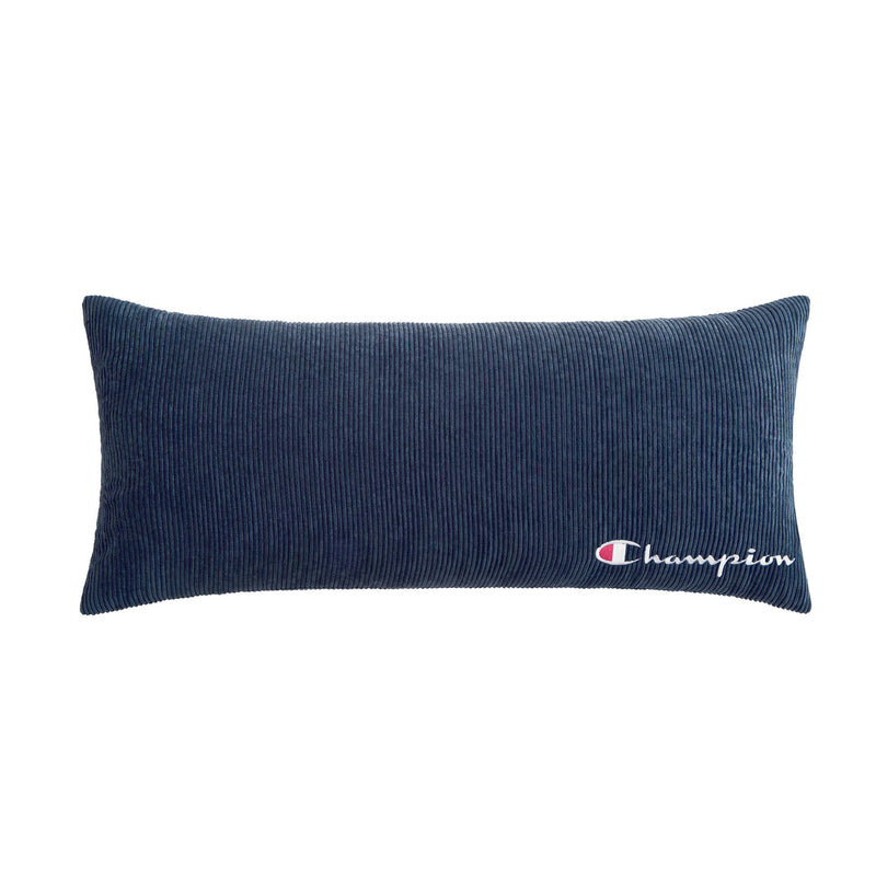 The Champion Corduroy Body Pillow is a rectangular, dark blue pillow featuring "champion" and the Champion brand logo embroidered in white and red on the bottom right corner—perfect for adding signature Champion comfort to any lounge space.