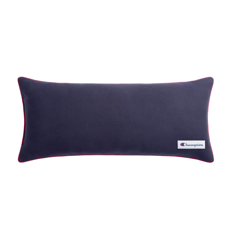The Champion Faux Wool Body Pillow features a rectangular navy blue design with red piping along the edges and a small Champion logo tag in the bottom right corner, creating a cozy Champion accent for any space.