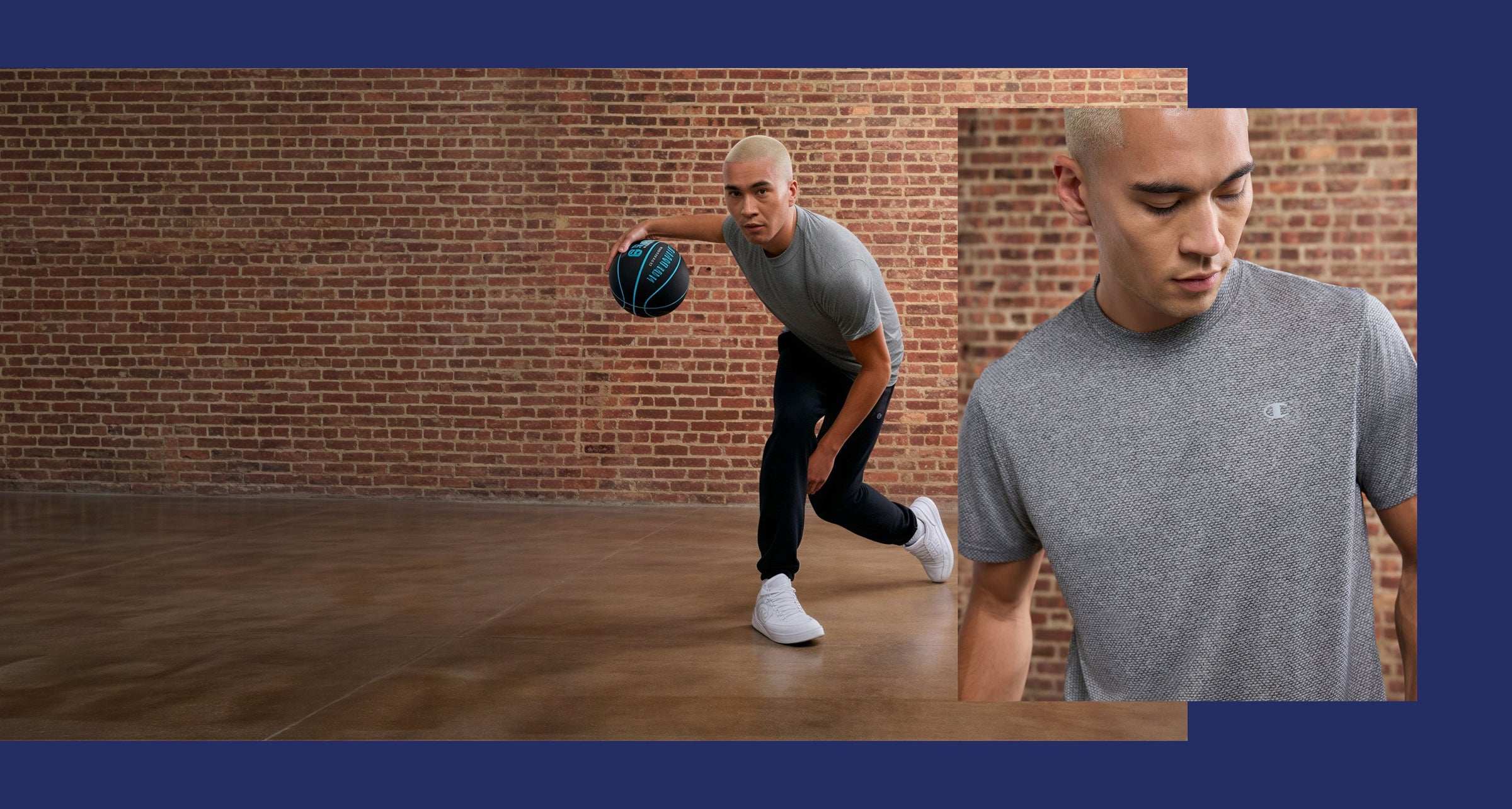 Man playing basketball with a close-up of a gray t-shirt against a brick wall.