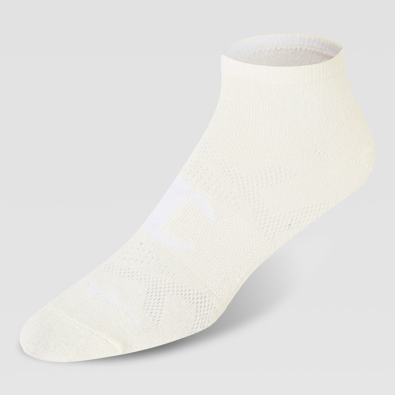 A Champion 10Pk Lightweight Low Cut white ankle sock featuring a subtle pattern and mesh detailing, shown on a plain light background.