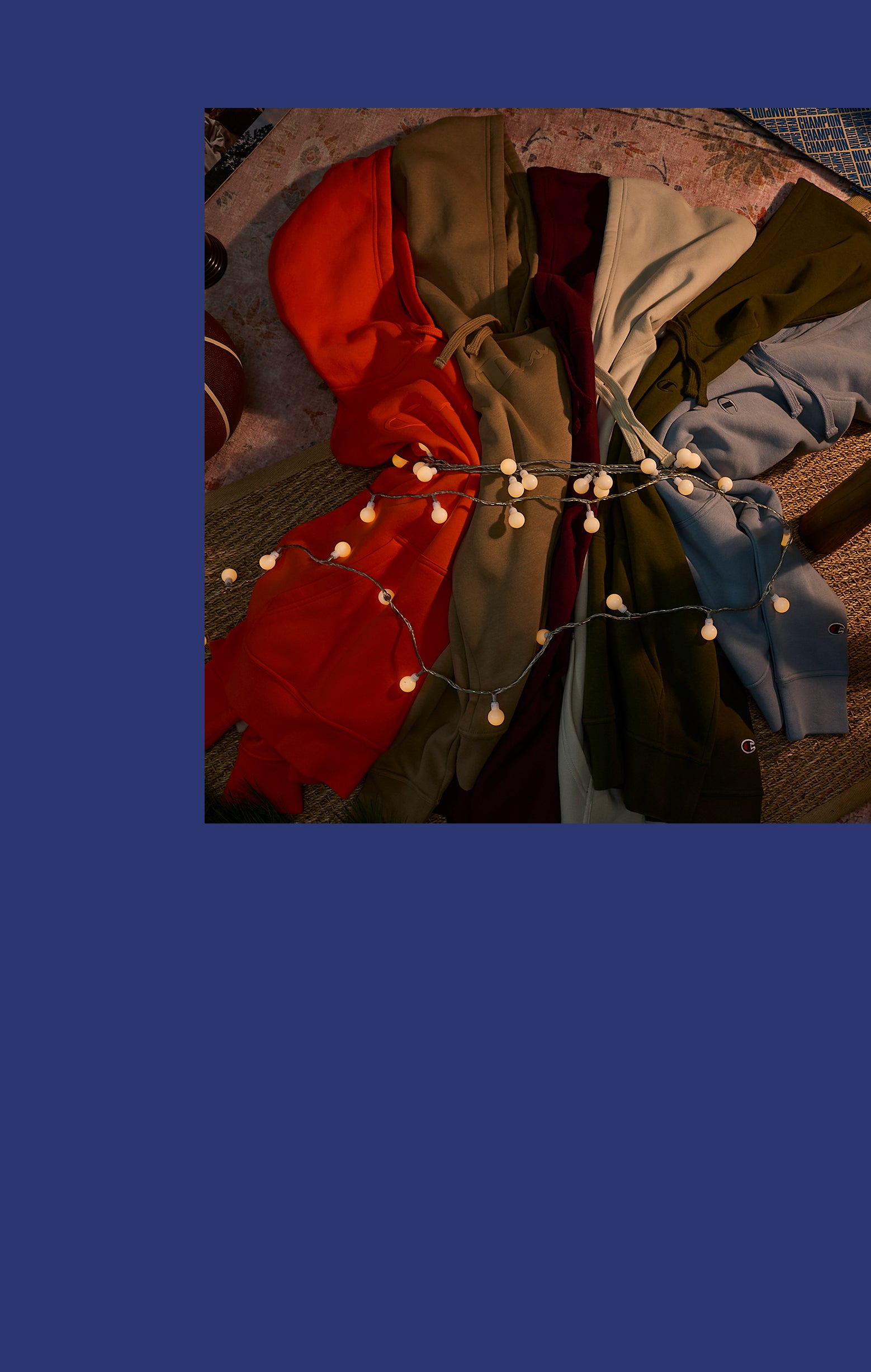 Colorful fabric swatches arranged in a circular pattern with string lights on a blue background.