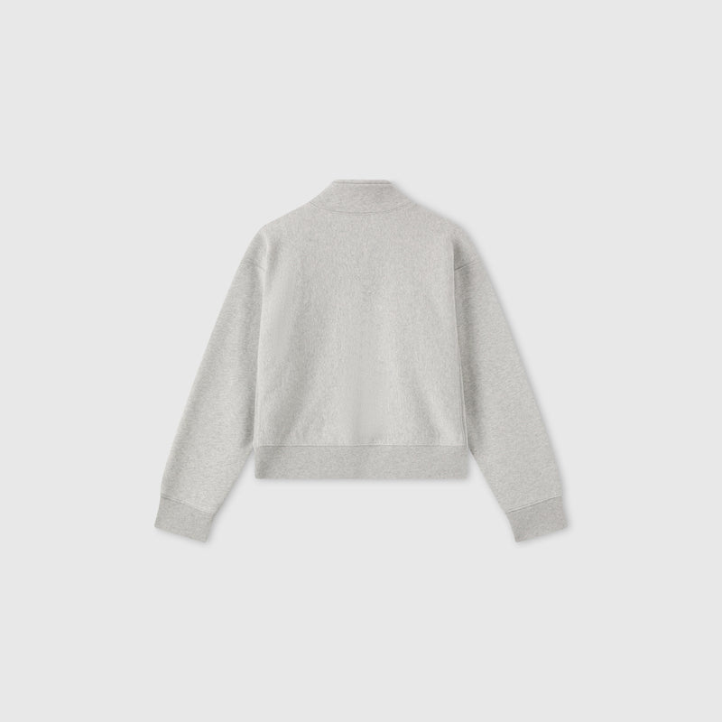 Back view of a light gray Women’s Knitted Half Zip Sweatshirt by Champion, featuring long sleeves with ribbed cuffs and hem, displayed against a plain white background.