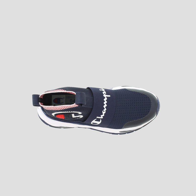 Top view of the Champion Kids' Rally Pro—navy slip-on shoe with a white sole, Champion logo in white script, black elastic band, red interior accents, and easy comfort inspired by knit kids’ sneakers.
