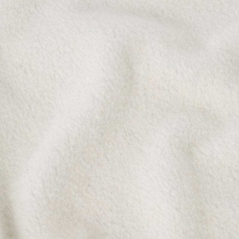 Close-up of soft, off-white heavyweight fleece with a slightly wavy texture and subtle shadows, highlighting the plush and cozy appearance typical of the Champion Men’s Relaxed Fit Crewneck Sweatshirt.