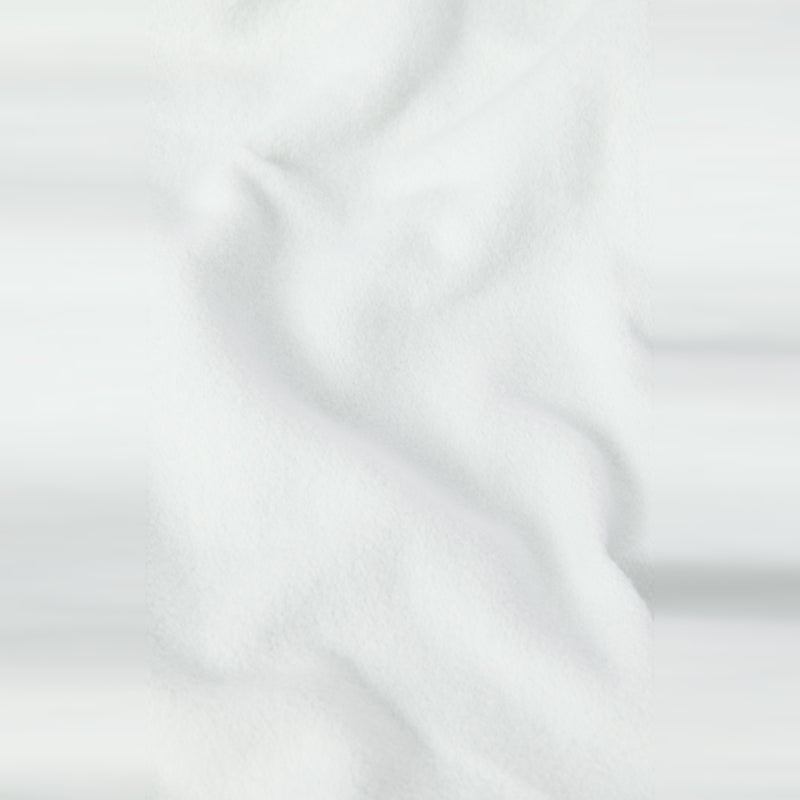 A close-up of soft, white fabric with gentle folds and subtle shadows, evoking the smooth, textured appearance of heavyweight fleece found in the Champion Men’s Knitted Hooded Sweatshirt (Embroidered Logo).
