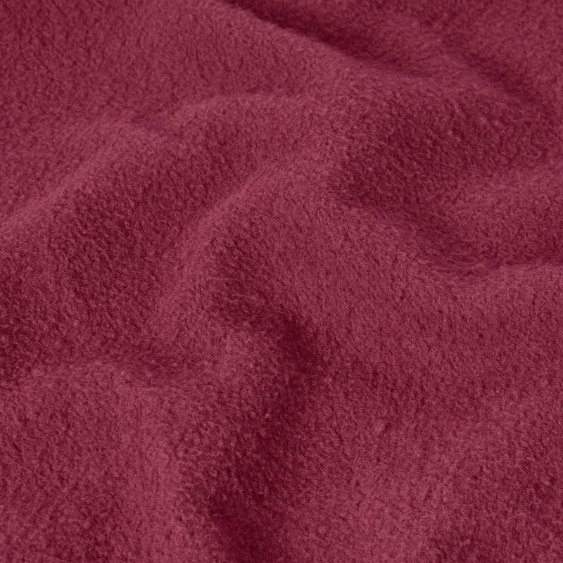 Close-up of textured maroon heavyweight fleece fabric, highlighting its soft and fuzzy surface with gentle folds and shadows—ideal for the Champion Men’s Knitted Hooded Sweatshirt.