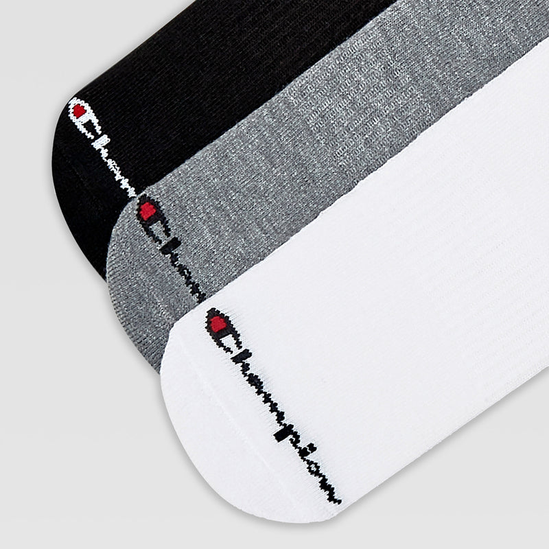 Five pairs of Champion men’s cushion crew socks are shown side by side, each with the Champion logo near the toe. These socks provide cushioned support and come in black, gray, and white.