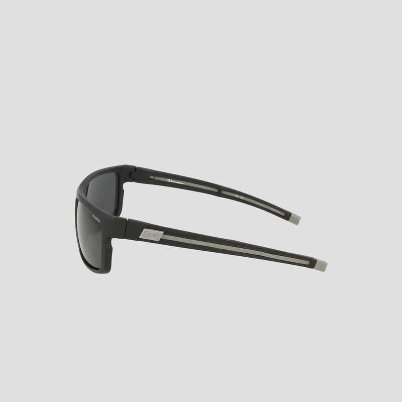 Side view of Champion Men's Polarized Wrap - Large sunglasses in black, featuring dark polarized lenses and straight, sturdy arms with a subtle silver logo near the hinges, displayed on a plain light gray background. This men's wrap frame delivers both durability and timeless style.