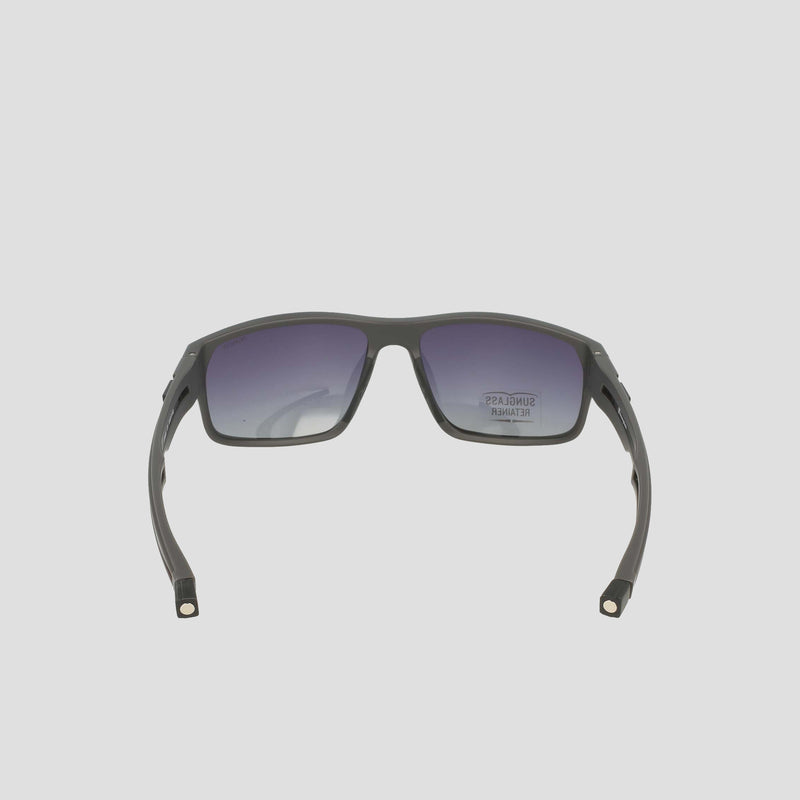 Men's Polarized Rectangle Retainer Wrap - Medium by Champion is shown from the rear, with the arms open and tips facing forward, displaying its black rectangular frame and dark gradient polarized lenses against a plain light gray background.