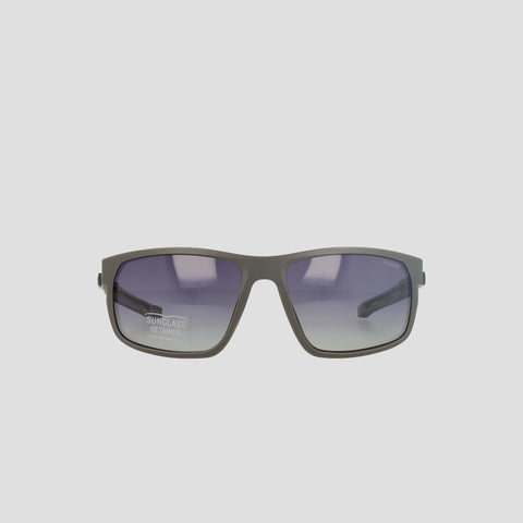 Champion Men's Polarized Rectangle Retainer Wrap - Medium sunglasses in dark gray are featured against a plain white background. The rectangular frames showcase gradient tinted, polarized lenses, with a discreet SUNGLASS RETAINER label on the left lens. With their simple, modern design, these sustainable sunglasses offer a stylish and practical choice.