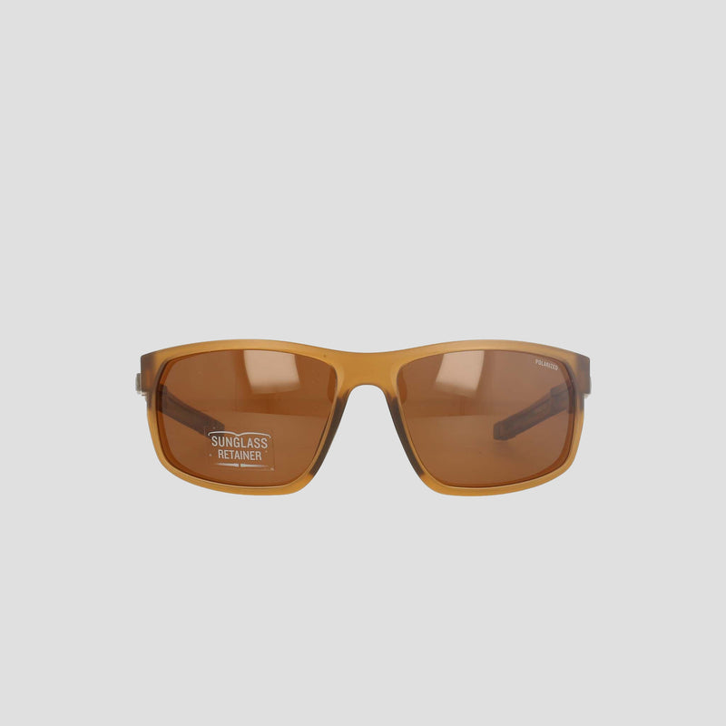Champion Men's Polarized Rectangle Retainer Wrap - Medium sunglasses feature brown-tinted, rectangular polarized lenses and a thick, amber-colored frame. A sticker on the left lens reads "SUNGLASS RETAINER," emphasizing the men's retainer frame design. The background is plain and light gray.