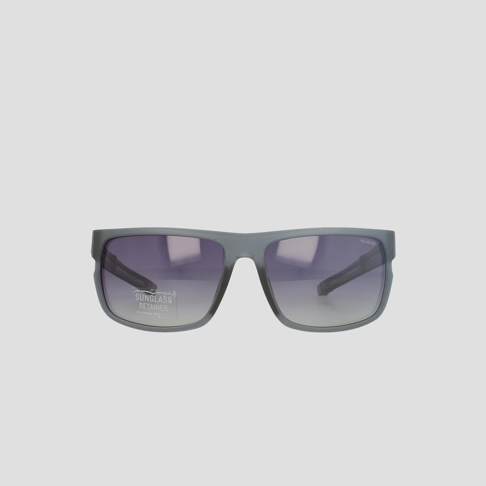 Champion Men's Polarized Wrap - Large sunglasses, shown from the front against a plain white background. These gray rectangular sunglasses feature gradient dark-to-light polarized lenses and a sustainable bio-based frame, with a small white SUNGLASS RETAINER label on the left lens.