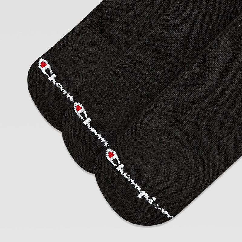 Six pairs of black Champion Men's Cushion Low Cut Socks are displayed side by side, each with an embroidered Champion logo and the word "Champion" near the toe. These cushioned socks provide comfortable all-day wear.