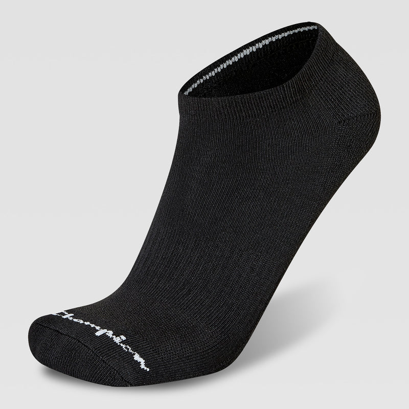 A single black Champion 6Pk Mens Cushion Low Cut sock with cushioned comfort, white trim inside the cuff, and small white branding near the toes is shown on a plain light gray background.