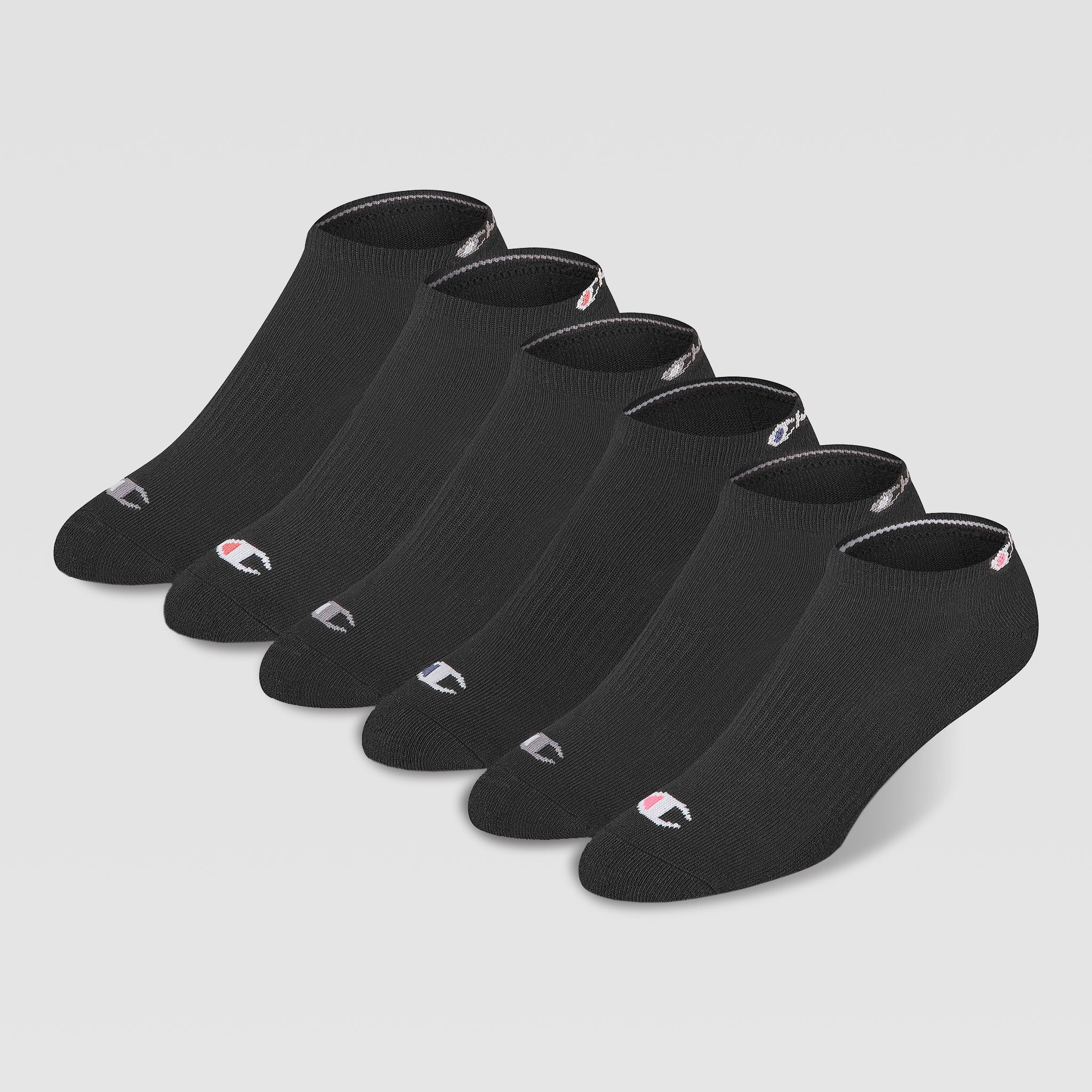 Six pairs of Champion 6Pk Womens Cushion Low Cut socks, featuring cushioned support and a small white and red logo on the toes, are neatly arranged in a row on a plain white background.