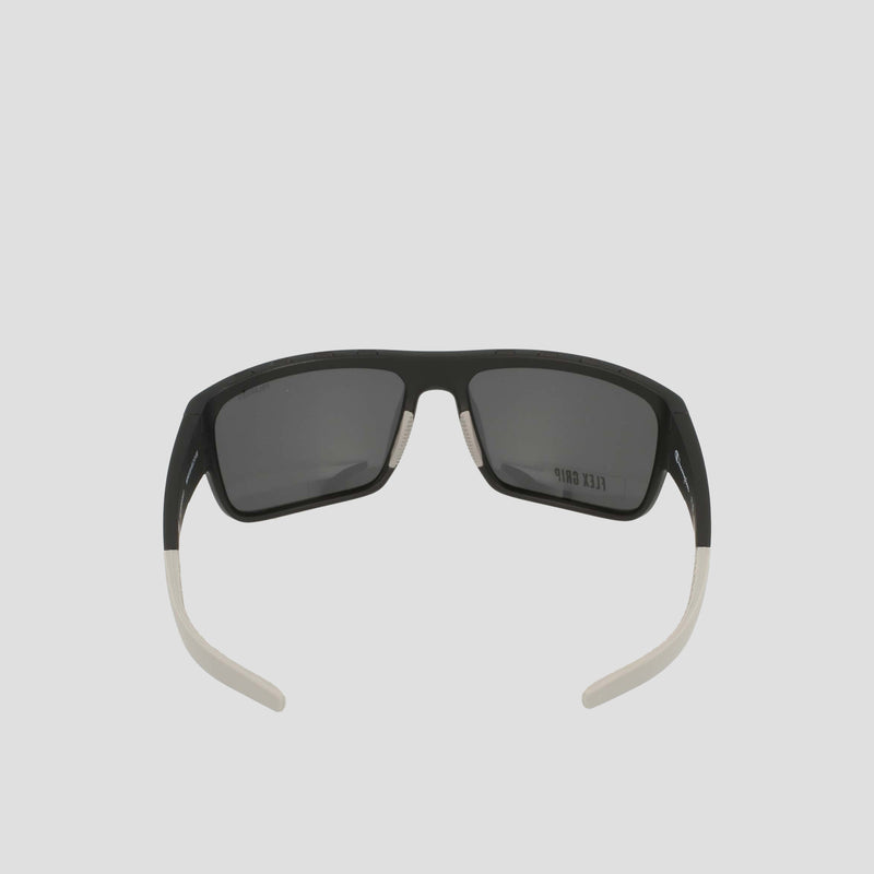 A pair of Champion Men's Polarized Grilamid Flex Grip Tip - Large sunglasses in black, featuring rectangular polarized lenses and distinctive white flex grip temple tips, displayed from the back with the arms slightly open against a plain light background.