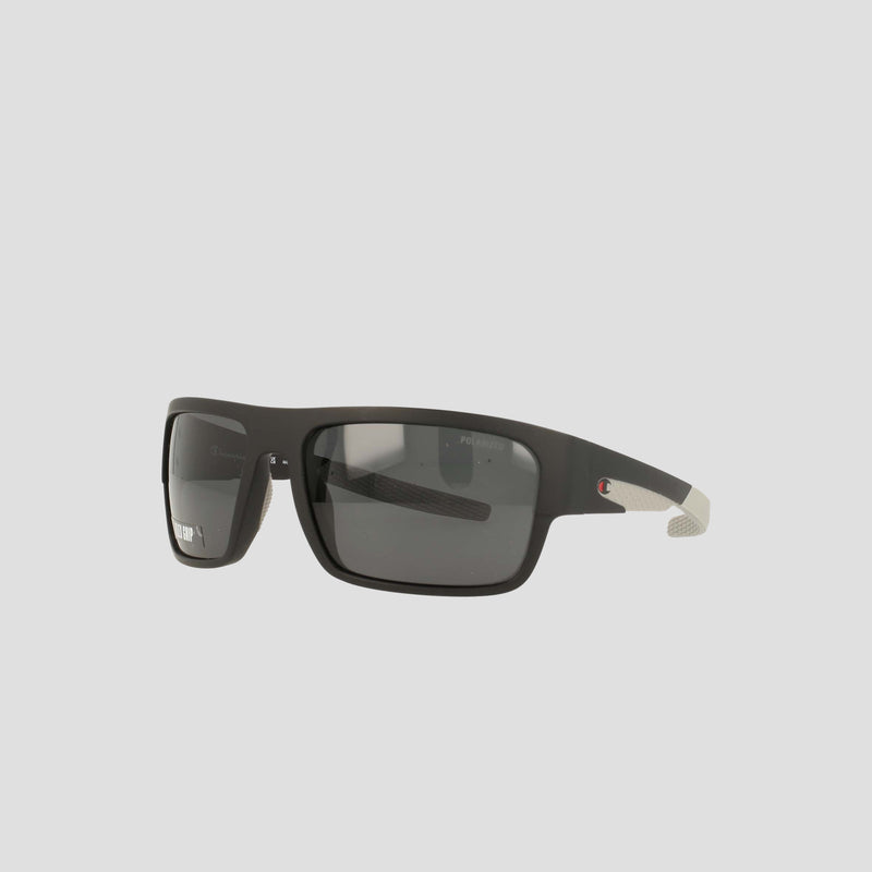 Champion Men’s Polarized Grilamid Flex Grip Tip - Large sunglasses in black, featuring a rectangular shape with dark lenses and thick arms that have a textured white section near the temples. Crafted for ultra-lightweight comfort and displayed on a light gray background.
