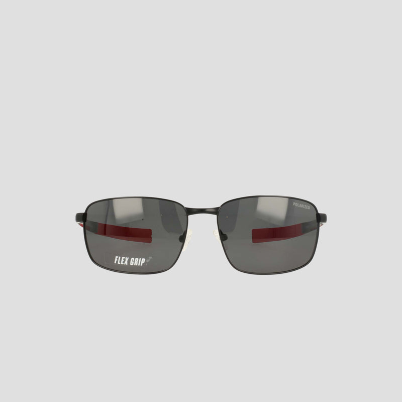 A pair of Champion Men's Polarized Stainless ST-Shirtl Flex Grip Tip sunglasses featuring a black rectangular frame with dark polarized lenses and FLEX GRIP tips, showcased against a plain light gray background—ideal for active lifestyles.