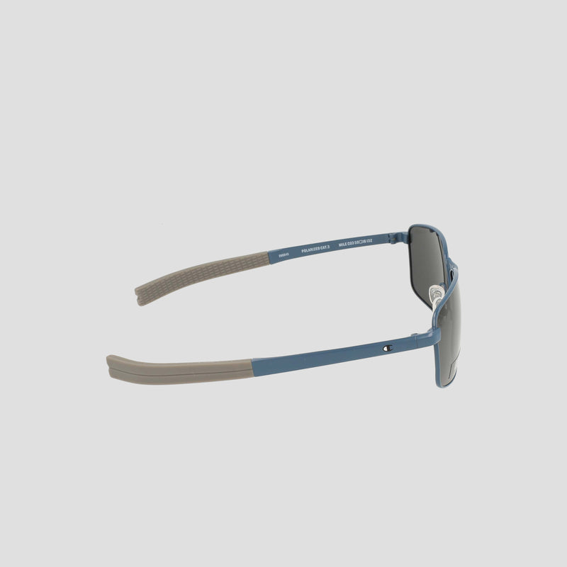 Men's Polarized Stainless ST-Shirtl Flex Grip Tip sunglasses by Champion, featuring blue frames with gray arms and dark polarized lenses for enhanced clarity, displayed from a side angle on a plain white background.