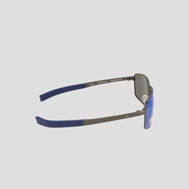 Side view of Champion Men's Polarized Stainless ST-Shirtl Flex Grip Tip sunglasses, featuring metal retainer frames, blue flex grip plastic temple tips, and dark polarized lenses—displayed against a plain light gray background—perfect for active lifestyles.