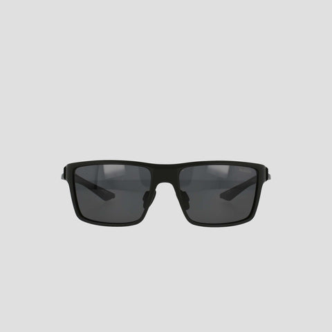 A pair of Champion Men's Polarized Comfort Fit - Medium sunglasses featuring a black rectangular design with dark lenses and a lightweight frame, displayed against a plain light gray background.