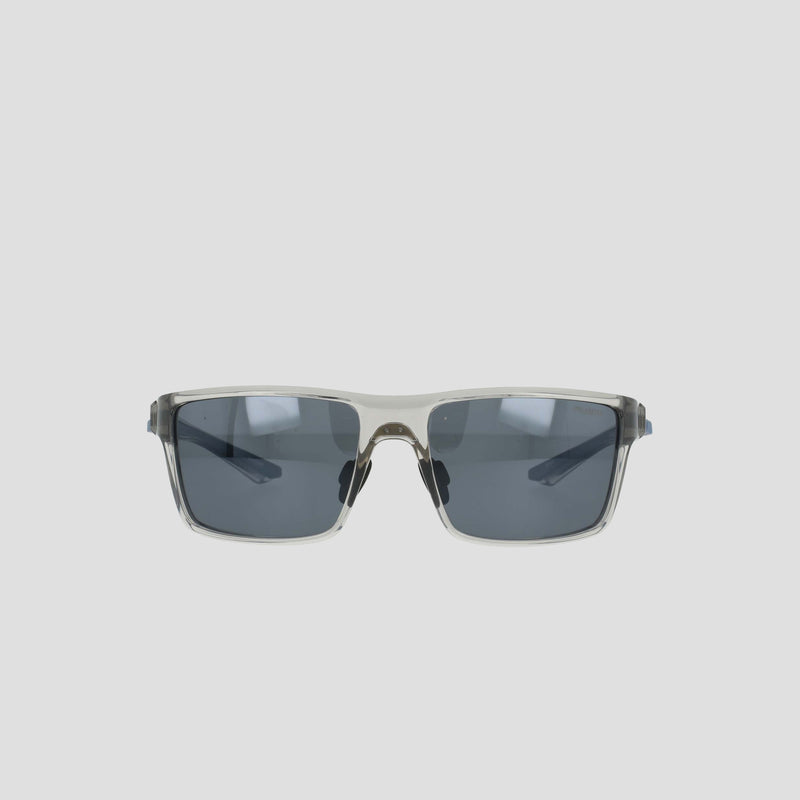 Men's Polarized Comfort Fit - Medium sunglasses by Champion, featuring a lightweight rectangular frame with a clear design and dark lenses, displayed against a plain light gray background.