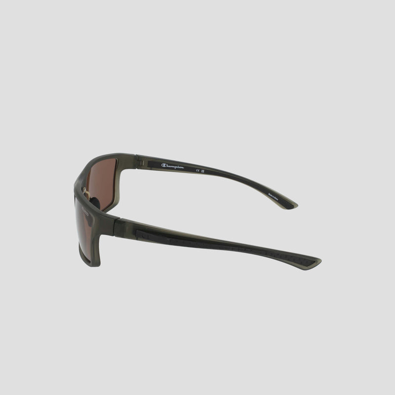 Men's Polarized Comfort Fit - Medium sunglasses by Champion, featuring a black rectangular TR90 frame with dark polarized lenses. Shown from the side and slightly above, this view highlights the smooth curve of the arms and a visible Champion logo on the inner side of the right arm. The background is a plain light gray.