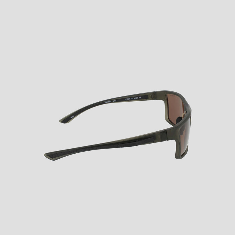 Side view of the Champion Men's Polarized Comfort Fit - Medium sunglasses in dark green with a rectangular shape, brown-tinted polarized lenses, and thick arms, featuring a lightweight TR90 frame, shown on a plain light gray background.