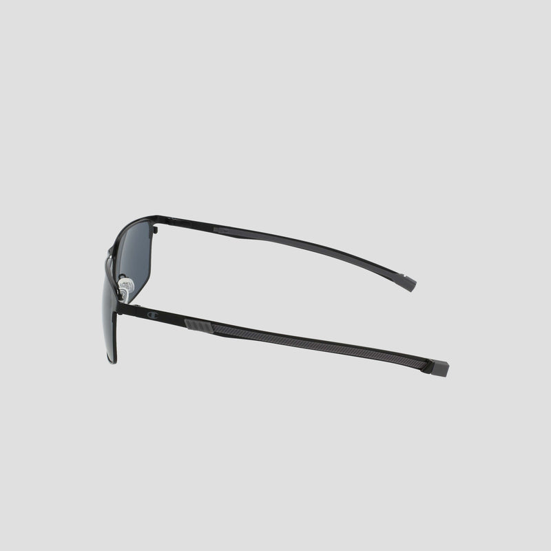 The Champion Men's Polarized Retainer Stainless ST-Shirtl Square sunglasses are displayed from the side, highlighting their sleek black design with dark polarized lenses and thin, textured stainless steel arms against a plain light grey background.