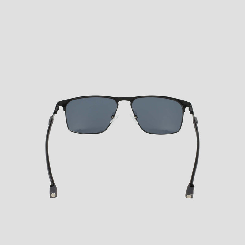 Men’s Polarized Retainer Stainless ST-Shirtl Square sunglasses by Champion, featuring a black square frame with dark polarized lenses. Shown from the front on a plain light background, the design includes curved arms with small rectangular ends.