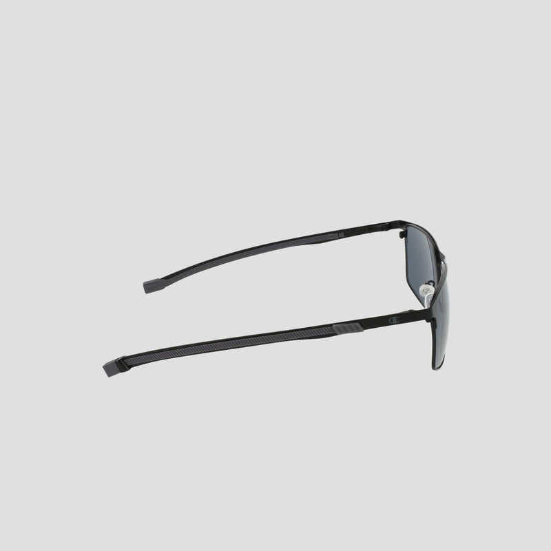 Champion Men's Polarized Retainer Stainless ST-Shirtl Square sunglasses are displayed from the side, highlighting their sleek minimalist frame with thin black stainless steel arms and dark polarized lenses. Set against a plain light gray background, these sunglasses are an ideal option for anyone seeking a sophisticated men’s retainer frame style.