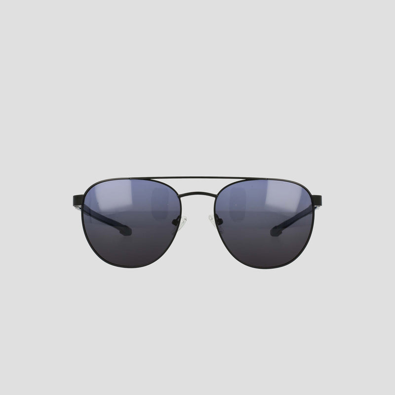 Men's Polarized Retainer Stainless ST-Shirtl Aviator sunglasses by Champion, featuring dark polarized lenses and an adjustable nose bridge, are displayed facing forward on a plain light gray background.