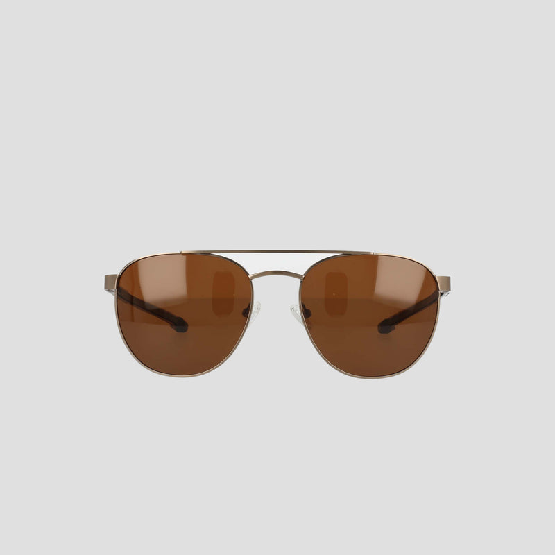 Front view of the Champion Men’s Polarized Retainer Stainless ST-Shirtl Aviator sunglasses, featuring brown tinted polarized lenses and a thin, lightweight stainless steel frame, displayed against a light gray background.