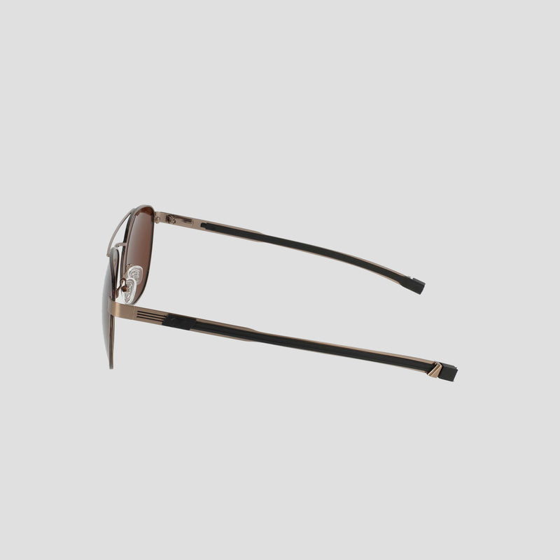 Side view of the Champion Men’s Polarized Retainer Stainless ST-Shirtl Aviator sunglasses, featuring slim gold stainless steel frames and black earpieces, set against a plain light grey background.