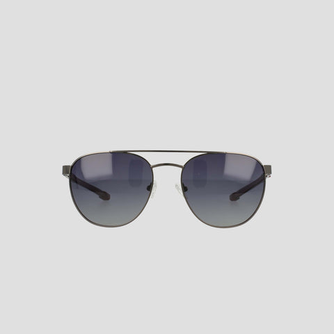A pair of Champion Men's Polarized Retainer Stainless ST-Shirtl Aviator sunglasses, featuring dark gradient polarized lenses and thin, lightweight black stainless steel frames, displayed against a plain light gray background.