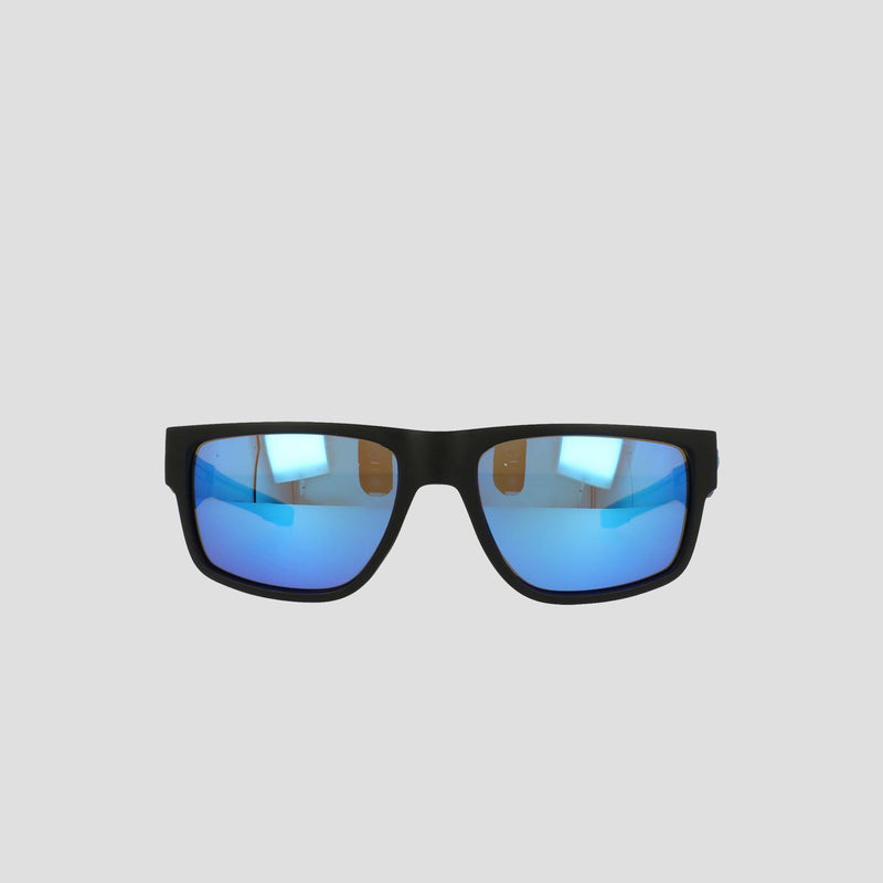 Men's Polarized Retainer Rectangle sunglasses by Champion, featuring a sleek black frame with blue mirrored, polarized lenses, are displayed against a plain light gray background. Crafted with a high-performance retainer design and durable TR90 construction, these shades subtly reflect lights and objects on their lenses.