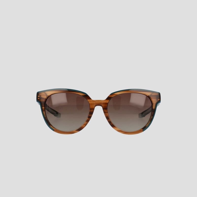 Champion Women's Polarized Retainer Round sunglasses feature brown tortoiseshell cateye frames and gradient brown lenses, designed for women’s eyewear and displayed against a plain light gray background.