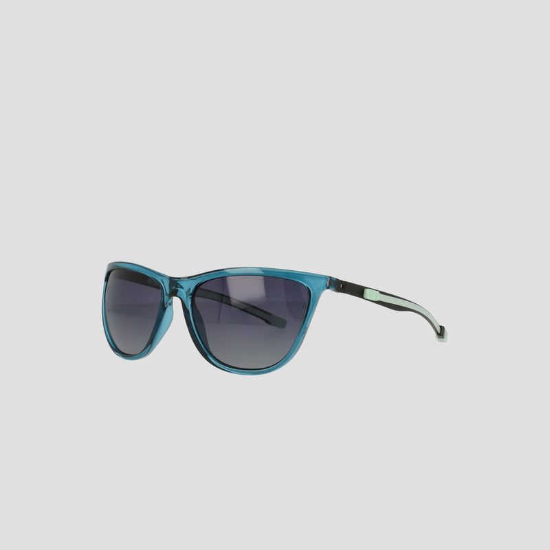 The Champion Women's Polarized Retainer Rectangle sunglasses in blue feature dark tinted polarized lenses, a gently curved frame, and slim black arms, displayed on a plain light gray background.