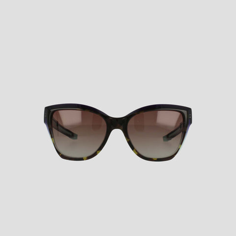 Front view of Champion Women's Polarized Retainer Square sunglasses, featuring an oversized design in handmade tortoiseshell acetate and gradient brown polarized lenses, displayed on a plain light gray background.