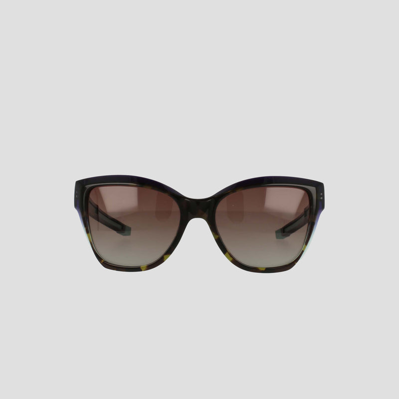 Front view of Champion Women's Polarized Retainer Square sunglasses, featuring an oversized design in handmade tortoiseshell acetate and gradient brown polarized lenses, displayed on a plain light gray background.