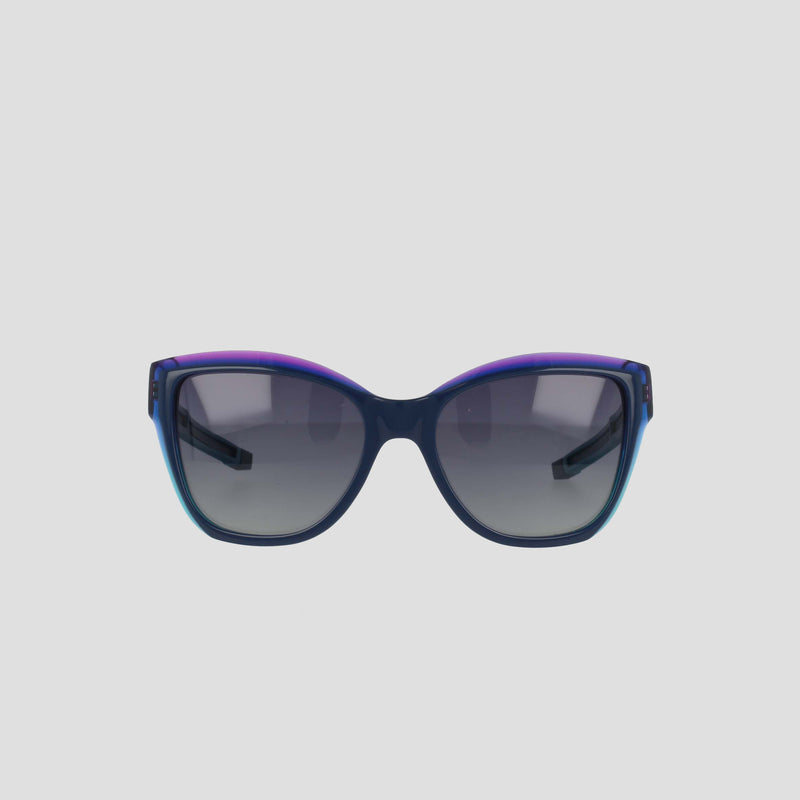 Front view of Champion Women's Polarized Retainer Square sunglasses with handmade acetate, dark polarized lenses, and a gradient blue-purple frame, displayed on a plain light gray background.