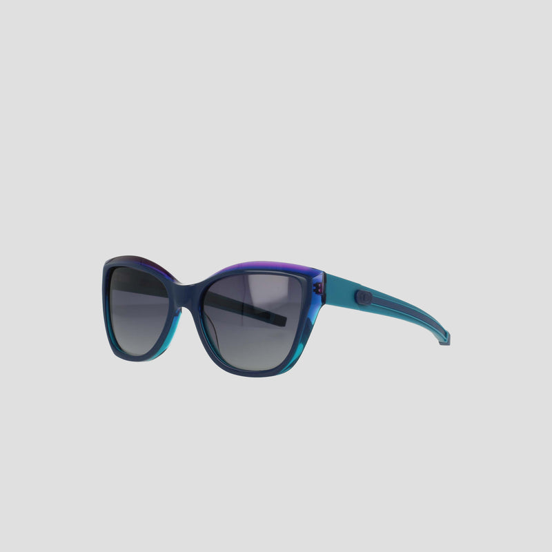 The Champion Women's Polarized Retainer Square sunglasses feature oversized square frames in blue and purple gradient handmade acetate with dark tinted lenses, shown against a light gray background.
