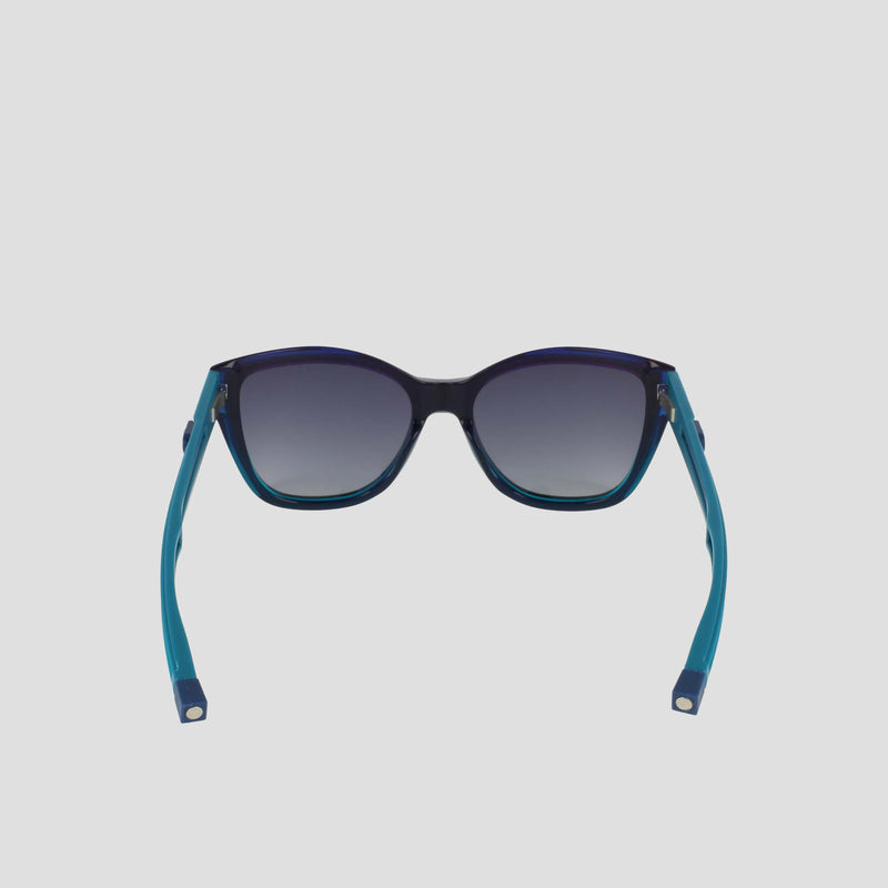 The Champion Women's Polarized Retainer Square sunglasses feature blue handmade acetate frames and dark gradient lenses, shown from the back with open arms against a plain light background.