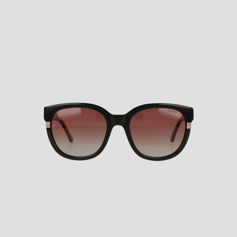Women's Polarized Curvaceous Square sunglasses by Champion, featuring large, curvaceous square frames crafted from luxury acetate and fitted with high-quality polarized gradient brown-tinted lenses. The sunglasses are displayed against a plain light gray background.