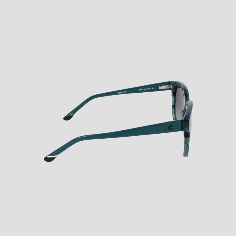 Here’s a rewritten version of the sentence using the provided product data: The Champion Women's Polarized Curvaceous Square sunglasses in teal are shown from the side, highlighting one polarized lens, the glossy acetate frame, and both arms against a plain light gray background.