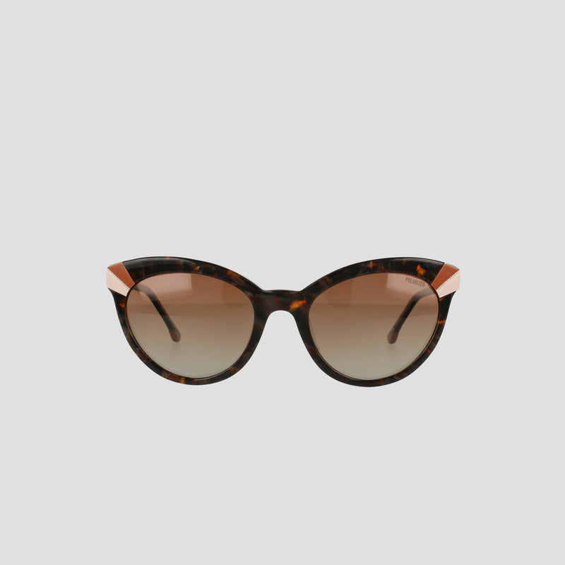 Champion Women's Polarized Cateye sunglasses with a tortoiseshell cat-eye frame, gold accents on the upper corners, and gradient brown polarized lenses featuring RX-able frames, displayed against a plain light gray background.