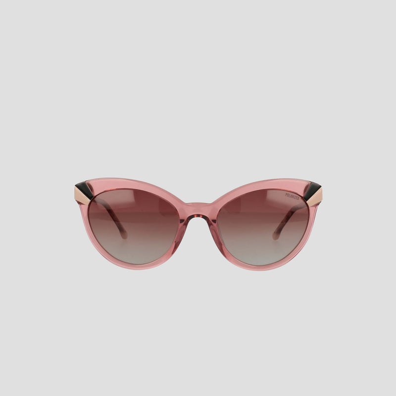 Women's Polarized Cateye sunglasses by Champion, featuring a pink cat-eye frame with gradient polarized lenses and gold accents at the corners, showcased against a plain light background.