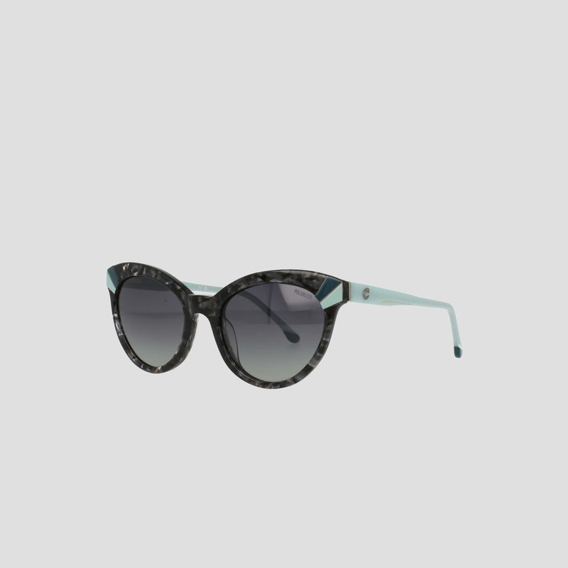 The Champion Women's Polarized Cateye sunglasses, featuring tortoiseshell patterned frames, polarized gradient lenses, and light blue temples, are displayed on a plain, light gray background.