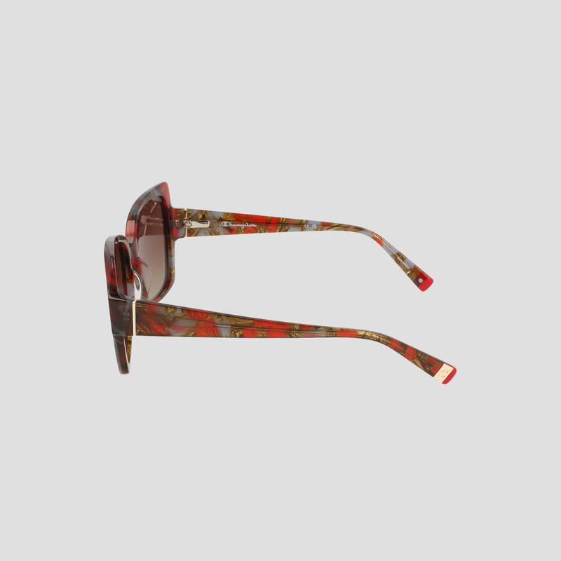 Side view of the Champion Women's Polarized Oversized Butterfly sunglasses, featuring stylish handmade acetate frames and temples in a marbled red, brown, and gold pattern, set against a plain light gray background. This minimalist accessory blends bold design with contemporary elegance.
