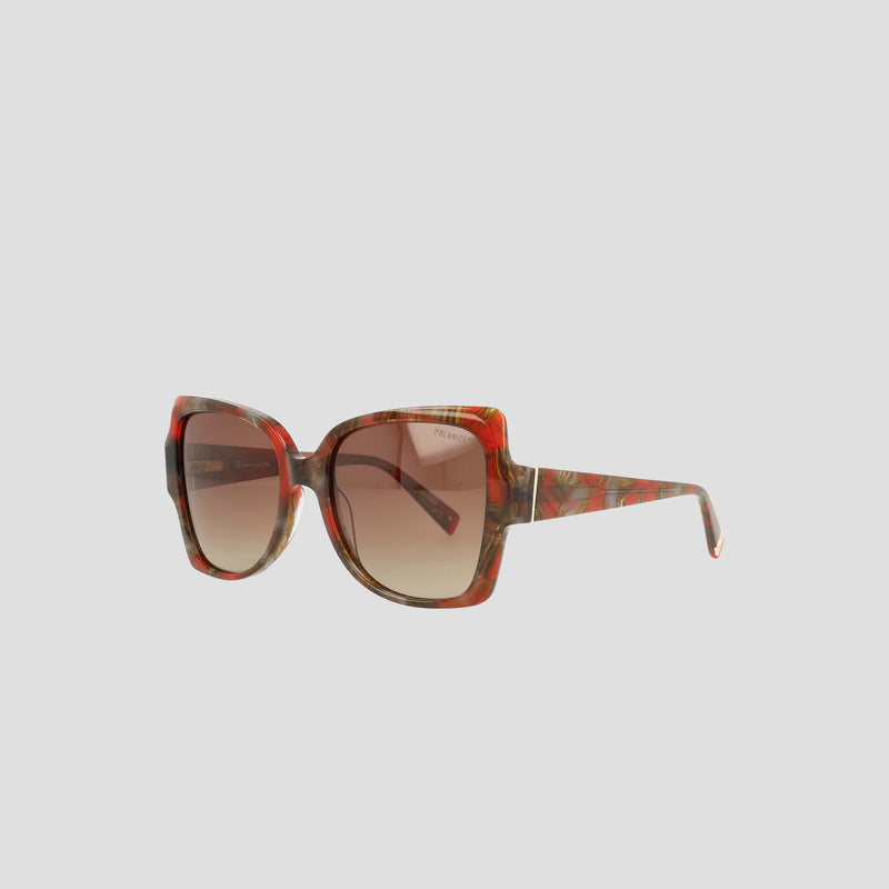 Introducing the Champion Women's Polarized Oversized Butterfly sunglasses—meticulously crafted from handmade acetate with bold red and brown tortoiseshell frames and gradient brown polarized lenses. Displayed on a simple light gray background, these standout sunglasses are perfect for fans of minimalist eyewear.